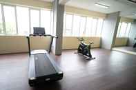 Fitness Center Tidy and Best Choice 2BR at Puncak Dharmahusada Apartment By Travelio