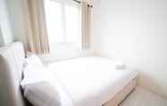 Kamar Tidur 3 Tidy and Best Choice 2BR at Puncak Dharmahusada Apartment By Travelio