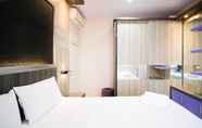 Bedroom 5 Homey and Best Location 2BR at Twin Tower Apartment By Travelio