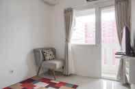 Common Space Well Designed and Cozy 2BR at Green Pramuka City Apartment By Travelio