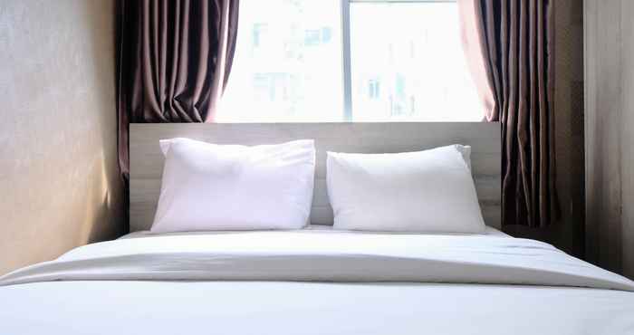 Kamar Tidur Homey and Cozy 2BR Apartment at Jarrdin Cihampelas By Travelio