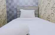 Bedroom 5 Homey and Cozy 2BR Apartment at Jarrdin Cihampelas By Travelio