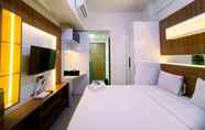 Kamar Tidur 3 Cozy Studio Apartment at 25th Floor Vida View Makassar By Travelio