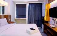 Kamar Tidur 5 Cozy Studio Apartment at 25th Floor Vida View Makassar By Travelio