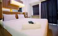 Bedroom 2 Cozy Studio Apartment at 25th Floor Vida View Makassar By Travelio