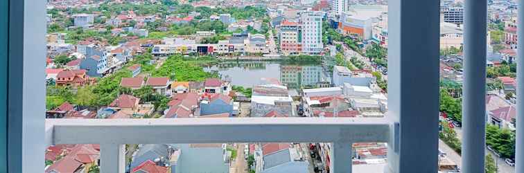 Lobi Cozy Studio Apartment at 25th Floor Vida View Makassar By Travelio