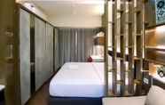 Bedroom 4 Cozy Studio Room Apartment at Uttara The Icon By Travelio