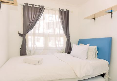 Bedroom Comfort 2BR Apartment at 22nd Floor Menara Kebon Jeruk By Travelio