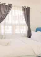 BEDROOM Comfort 2BR Apartment at 22nd Floor Menara Kebon Jeruk By Travelio