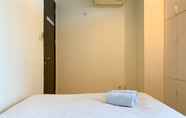 Bedroom 6 2BR with Queen Bed (Single Bed x2) at GP Plaza Apartment By Travelio