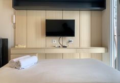 Bedroom 3 Simply and Cozy Look Studio Room Tokyo Riverside PIK 2 Apartment By Travelio