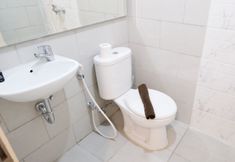 In-room Bathroom 5 Cozy Stay and Good Studio Connected with Mall at Supermall Mansion Apartment By Travelio
