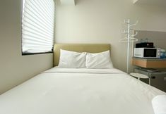 臥室 2 Modern Studio (No Kitchen) at Osaka Riverview PIK 2 Apartment By Travelio