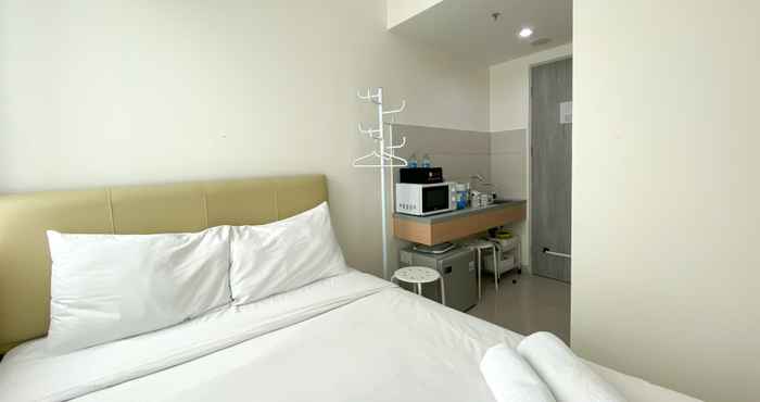 Bedroom Modern Studio (No Kitchen) at Osaka Riverview PIK 2 Apartment By Travelio