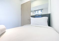Bedroom 2 Comfortable and Nice 2BR at 20th Floor Tokyo Riverside Apartment By Travelio