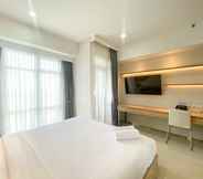 Bedroom 3 Elegant and Good Deal Studio Vasanta Innopark Apartment By Travelio