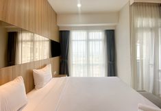 Bilik Tidur 7 Elegant and Good Deal Studio Vasanta Innopark Apartment By Travelio