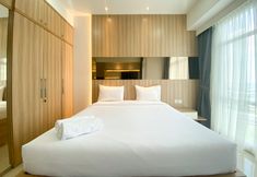 Bilik Tidur 2 Elegant and Good Deal Studio Vasanta Innopark Apartment By Travelio