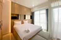 Ruang Umum Elegant and Good Deal Studio Vasanta Innopark Apartment By Travelio