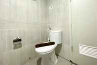 In-room Bathroom Elegant and Good Deal Studio Vasanta Innopark Apartment By Travelio