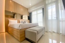 Lobi Elegant and Good Deal Studio Vasanta Innopark Apartment By Travelio