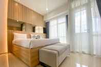 Lobby Elegant and Good Deal Studio Vasanta Innopark Apartment By Travelio