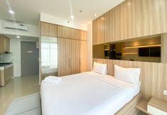 Bilik Tidur 5 Elegant and Good Deal Studio Vasanta Innopark Apartment By Travelio