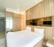 Bedroom 5 Elegant and Good Deal Studio Vasanta Innopark Apartment By Travelio