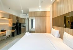 Bilik Tidur 4 Elegant and Good Deal Studio Vasanta Innopark Apartment By Travelio
