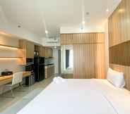 Bedroom 4 Elegant and Good Deal Studio Vasanta Innopark Apartment By Travelio