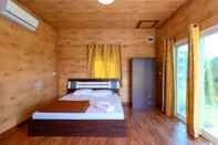 ห้องนอน Beung Sampathuan Nakornchaisri Resort