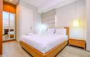 Kamar Tidur 6 Homey and Spacious 2BR Apartment at One Park Residence By Travelio