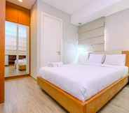 Bedroom 6 Homey and Spacious 2BR Apartment at One Park Residence By Travelio