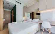 Bedroom 3 Cozy Stay Studio Apartment at Tree Park City BSD By Travelio