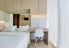 Bedroom 5 Cozy Stay Studio Apartment at Tree Park City BSD By Travelio