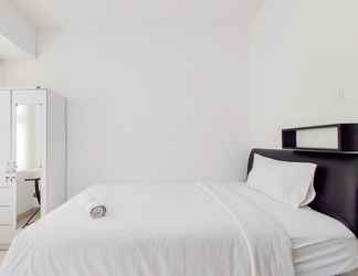 Bedroom 2 Strategic Minimalist Studio at Apartment Serpong Garden By Travelio