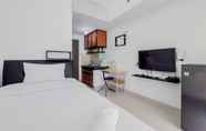 Bedroom 4 Strategic Minimalist Studio at Apartment Serpong Garden By Travelio