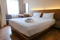 Kamar Tidur Homey Studio Room Apartment No Kitchen at Grand Setiabudi By Travelio