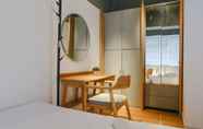 Bedroom 5 Studio Apartment with Private Living Room at Jarrdin Cihampelas By Travelio