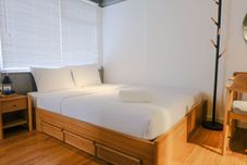 Kamar Tidur Studio Apartment with Private Living Room at Jarrdin Cihampelas By Travelio