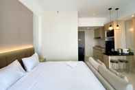 Bedroom Comfy and Best Choice Studio Vasanta Innopark Apartment By Travelio