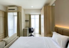 Bedroom 5 Comfy and Best Choice Studio Vasanta Innopark Apartment By Travelio