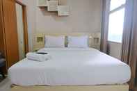 Kamar Tidur Homey Studio Apartment at 1st Floor Grand Asia Afrika By Travelio