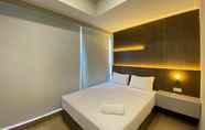 Kamar Tidur 7 Comfort 2BR Apartment at Menteng Park By Travelio