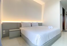 Bedroom 4 Warm and Cozy Living Studio Apartment at West Vista By Travelio