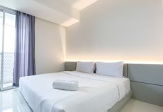 Bedroom 3 Warm and Cozy Living Studio Apartment at West Vista By Travelio