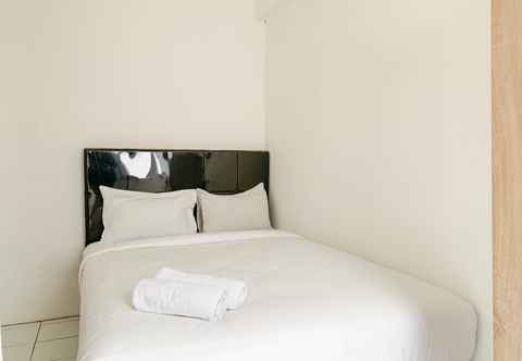 Bedroom Cozy 2BR Apartment at Delta Cakung By Travelio