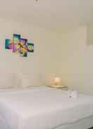 BEDROOM Homey and Comfortable Studio Bintaro Icon Apartment By Travelio
