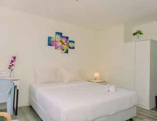 Kamar Tidur 2 Homey and Comfortable Studio Bintaro Icon Apartment By Travelio