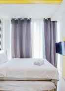 BEDROOM Minimalist Studio Apartment at Tree Park City BSD By Travelio